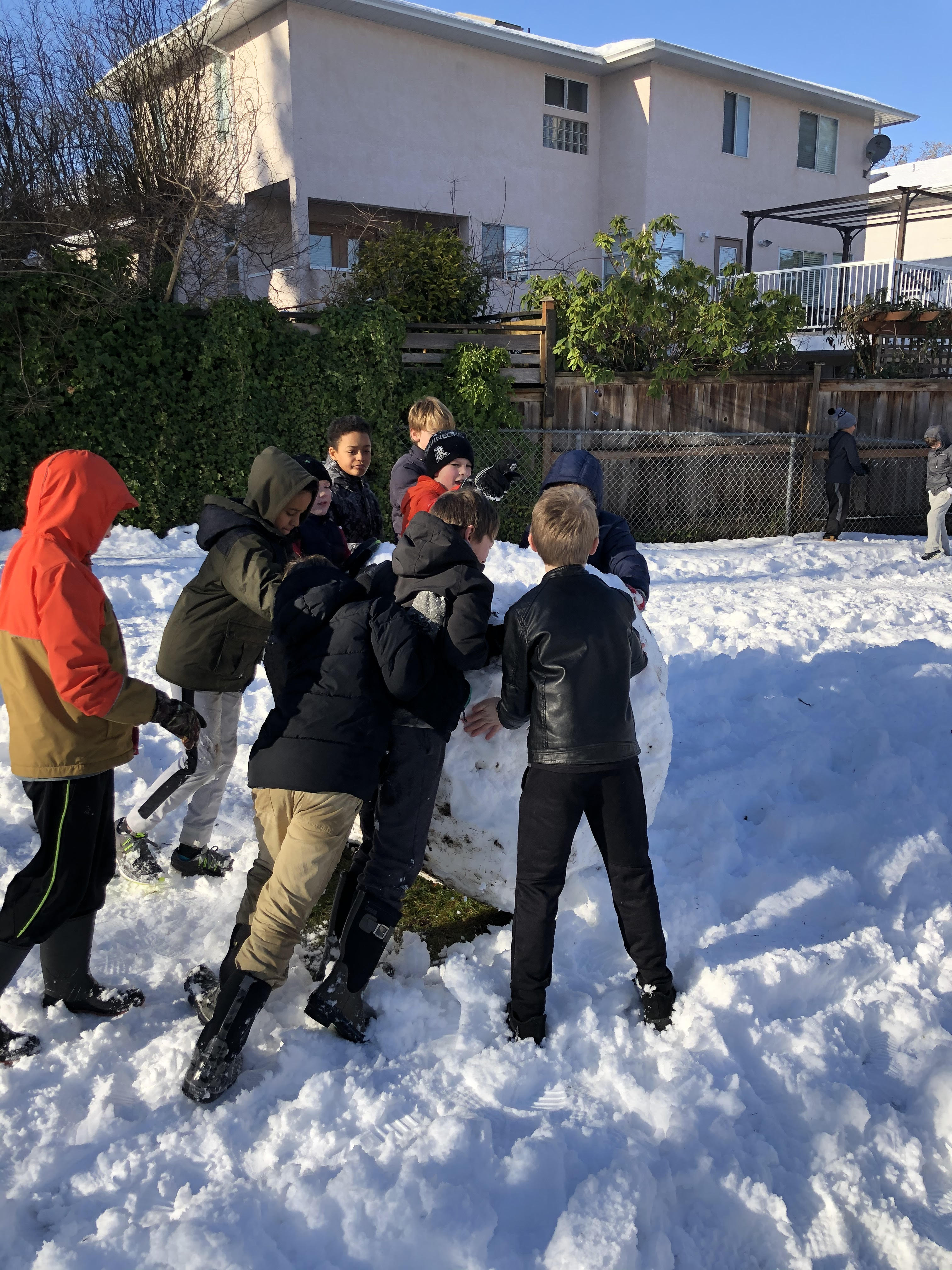 Children playing outside during care