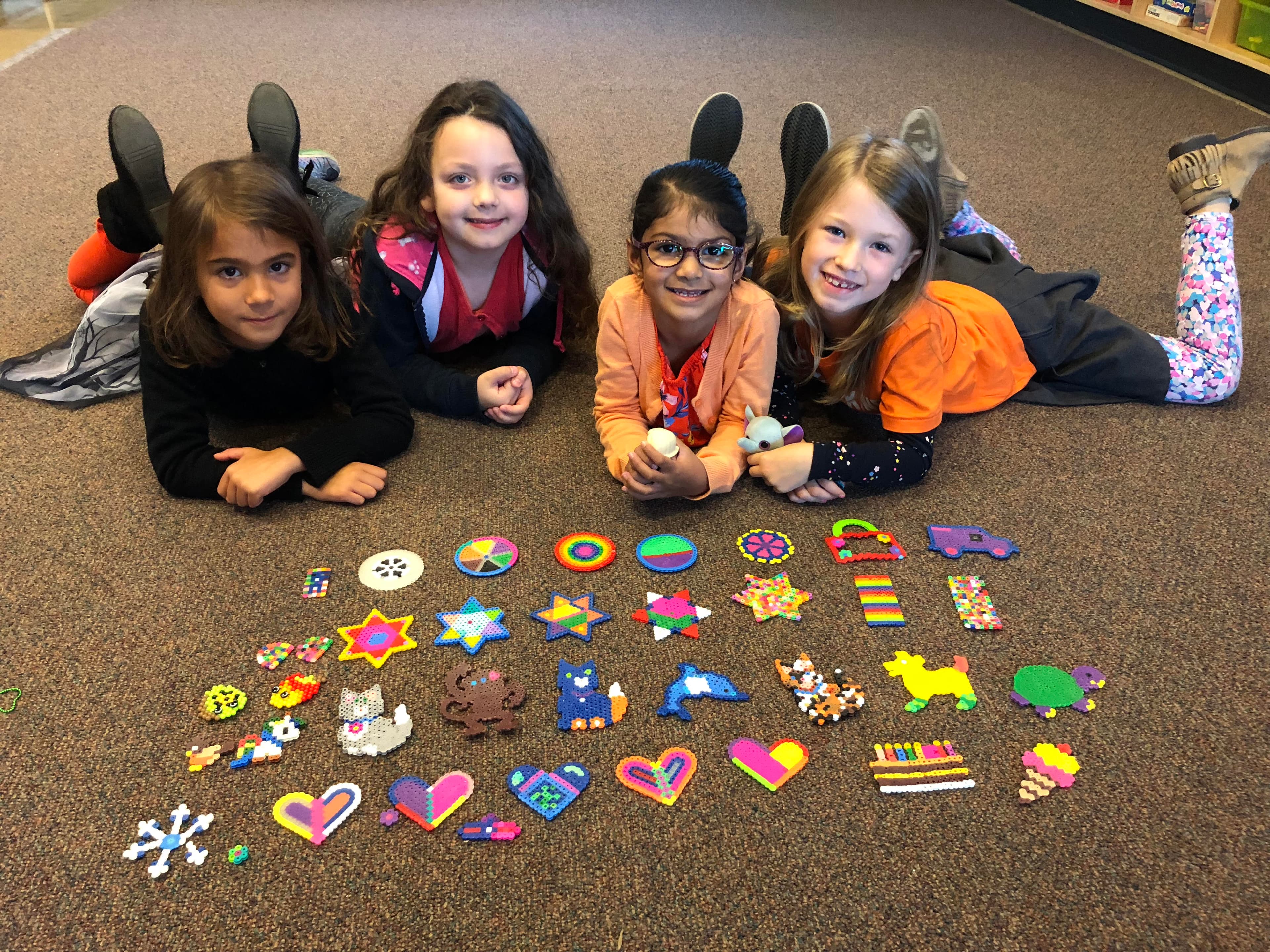 Children smiling together outside